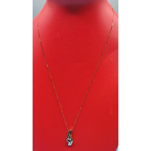 131 - 9ct Gold and Diamond Earrings and Pendant Set. 5 Grams.