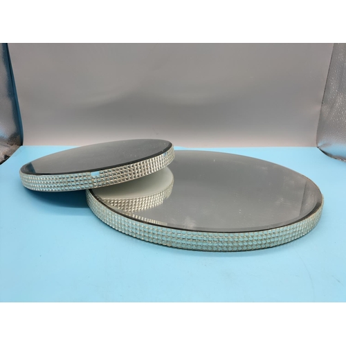 220 - Mirrored Display Stands (2). Largest having a Diameter of 30cm.
