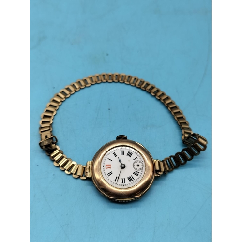 338 - 9ct Cased Rolex Movement Watch with Gold Tone Strap. A/F  Glass and Requires Second Finger.