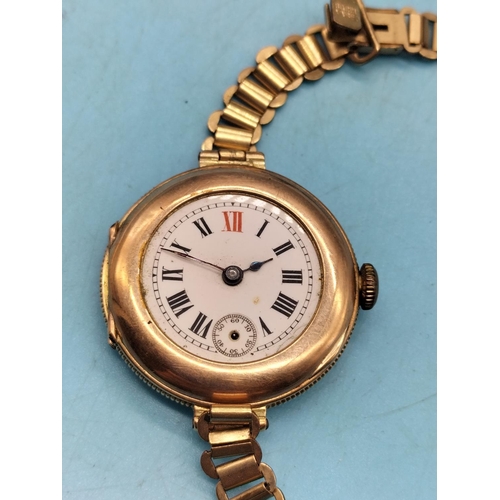 338 - 9ct Cased Rolex Movement Watch with Gold Tone Strap. A/F  Glass and Requires Second Finger.