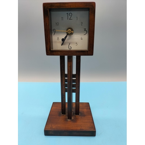 353 - Wooden Mantle Clock in the Charles Rennie Mackintosh Style. 24.5cm High.