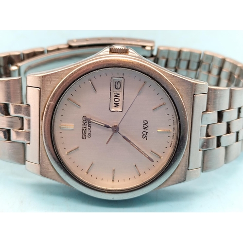 364 - Seiko Quartz SQ100 Time and Date Watch.