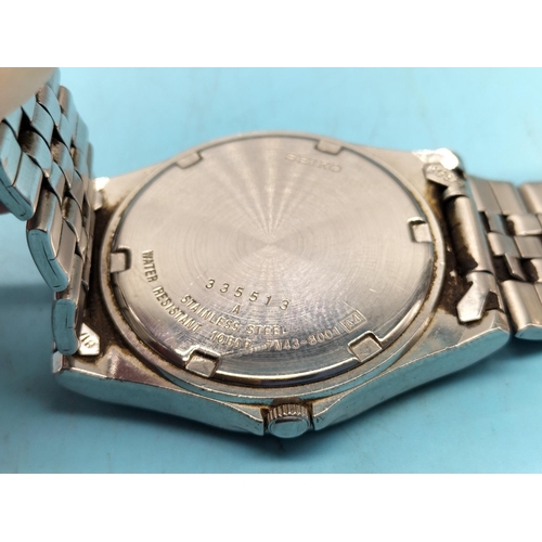 364 - Seiko Quartz SQ100 Time and Date Watch.