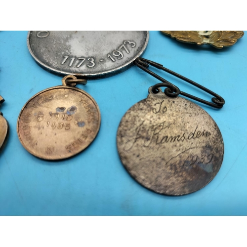 50A - Collection of Medals plus RAF Cap Badge. Some Silver.