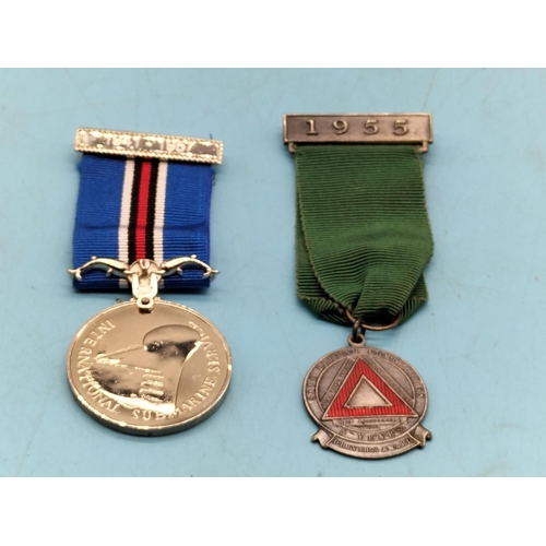 255 - Medals (2) - Safe Driving (Fattorini and Sons, Birmingham) and International Submarine Service.