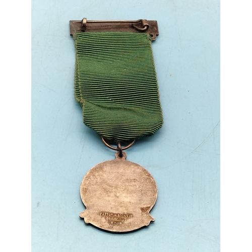 255 - Medals (2) - Safe Driving (Fattorini and Sons, Birmingham) and International Submarine Service.