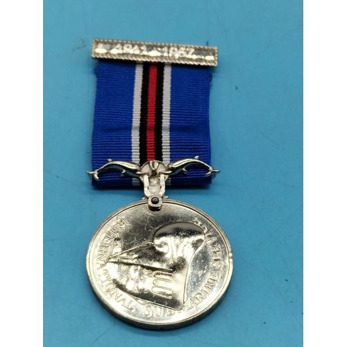 255 - Medals (2) - Safe Driving (Fattorini and Sons, Birmingham) and International Submarine Service.