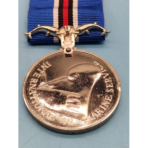 255 - Medals (2) - Safe Driving (Fattorini and Sons, Birmingham) and International Submarine Service.