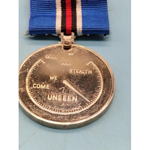 255 - Medals (2) - Safe Driving (Fattorini and Sons, Birmingham) and International Submarine Service.