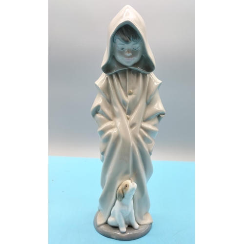 222 - Nao Figure of a Boy with Dog. 27cm Tall.