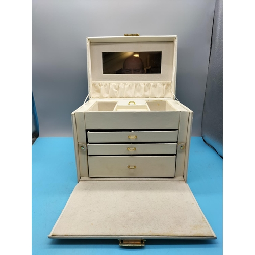 382 - Ivory Faux Leather Make Up case. 22cm High. All proceeds from this Lot to the Ukraine Fund.