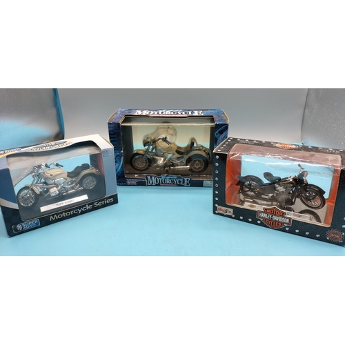 387 - 3 x Boxed Die-Cast Motorcycles to include Harley Davidson.