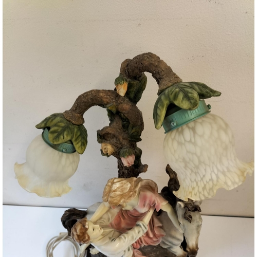 137 - Juliana Collection Large Lamp with Lady on Horse and Man Lifting Her Down. 67cm High, 32cm x 24cm.