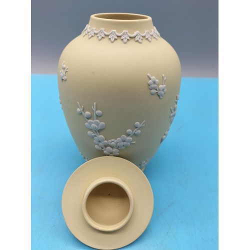 143 - Wedgwood Yellow Jasper Temple Jar in the 'Prunus' Pattern. 18cm Tall.