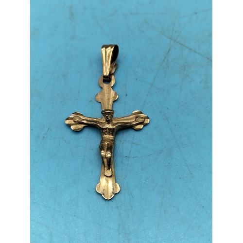 247 - 9ct 375 Crucifix.