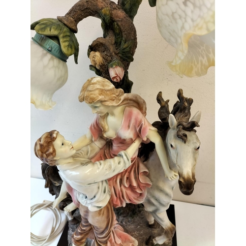 708 - Juliana Collection Large Lamp with Lady on Horse and Man Lifting Her Down. 67cm High, 32cm x 24cm.