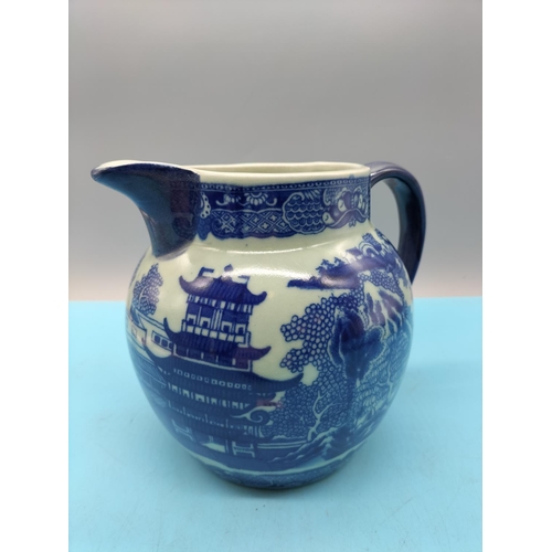 712 - Victorian Ironstone Blue and White 17cm Jug. 11cm Diameter.
