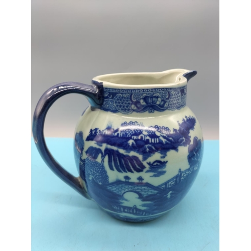712 - Victorian Ironstone Blue and White 17cm Jug. 11cm Diameter.