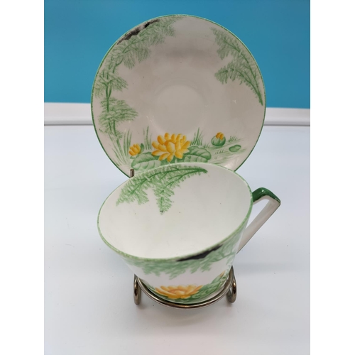 136 - Gladstone Pottery 'Waterlily' Cup and Saucer.