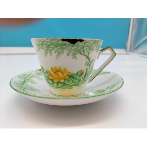 136 - Gladstone Pottery 'Waterlily' Cup and Saucer.