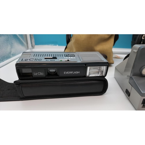 24 - Polaroid Land Camera in Grey with Case, Le Clic Fun Shooter FS10 plus Kodak EK2 Instant Camera.