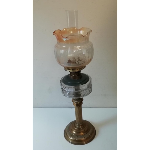 34 - Brass Columned Oil Lamp with Shade. Overall Height 66cm.