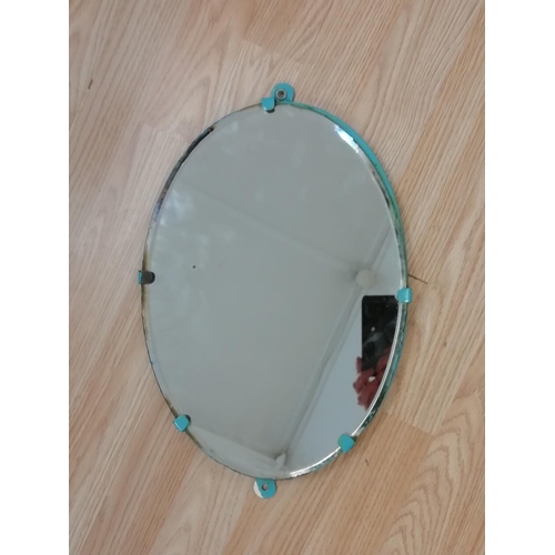 694 - Vintage Oval Shaped Wall Mounted Mirror with Wooden Base. 36cm x 26cm.