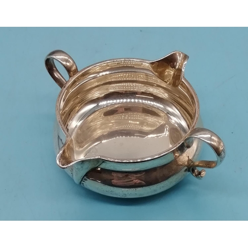 10 - Hallmarked Solid Silver Twin Handled Double Pour Jug. 106 Grams. Slight Dent.