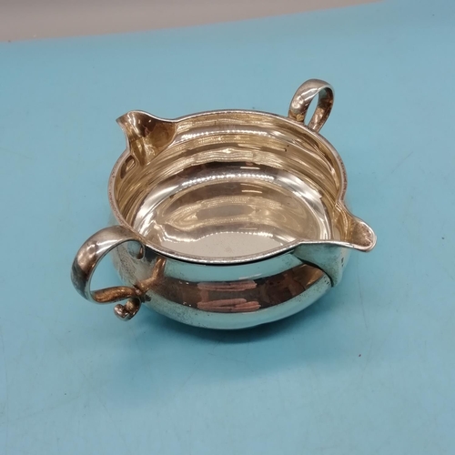 10 - Hallmarked Solid Silver Twin Handled Double Pour Jug. 106 Grams. Slight Dent.