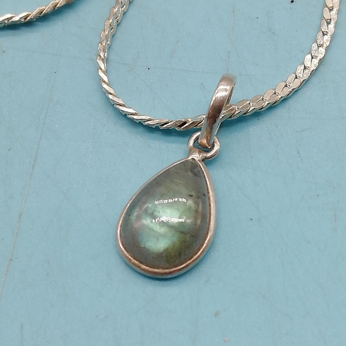 44 - 925 Silver Mounted Moonstone Pendant on 16