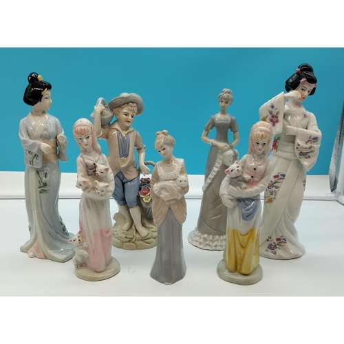 731 - Collection Of ceramic Figures (7). Tallest being 28cm. 2 Missing Parasols.