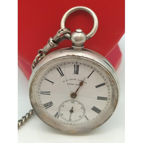 101 - H.E.Peck, London Swiss Made Silver Cased Pocket Watch plus Silver Hallmarked Albert Chain. Cracks on... 