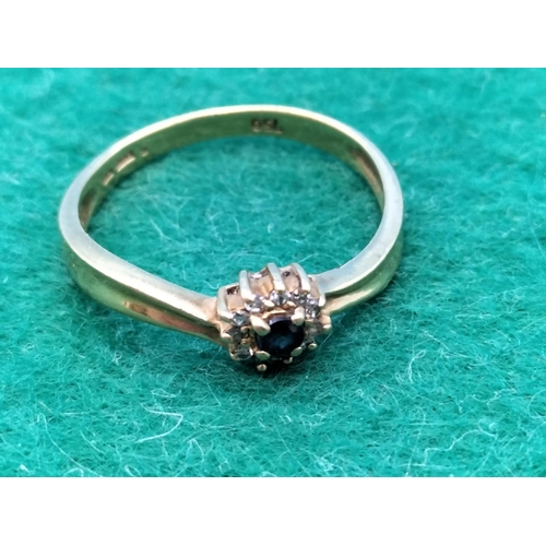 11 - 18ct Gold Sapphire and Diamond Ring. Marked 750. Size P. 2.62 Grams.