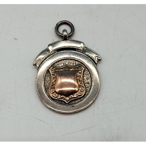 127 - Silver Pocket Watch Fob with Shield Design.