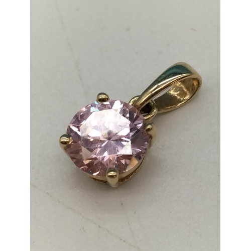 198 - 14ct Gold and Pink Cubic Zirconia Pendant.