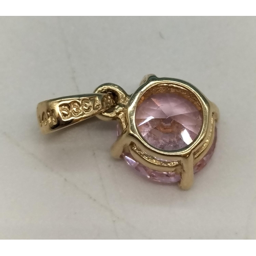 198 - 14ct Gold and Pink Cubic Zirconia Pendant.