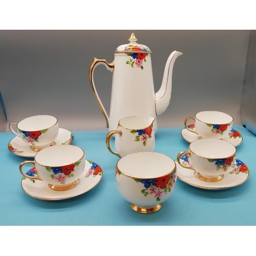 279 - Hand Painted 11 Piece Part Coffee Set with a Floral Pattern.