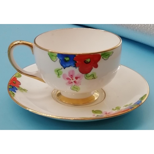 279 - Hand Painted 11 Piece Part Coffee Set with a Floral Pattern.