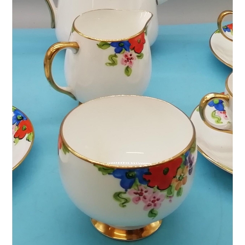 279 - Hand Painted 11 Piece Part Coffee Set with a Floral Pattern.