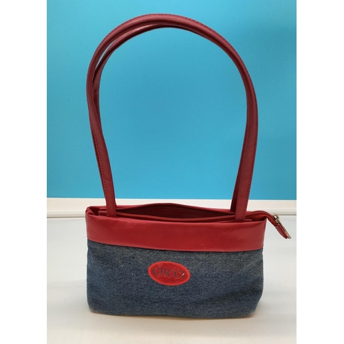 321 - Fashion Handbag. 24cm x 12cm (not including Handles).