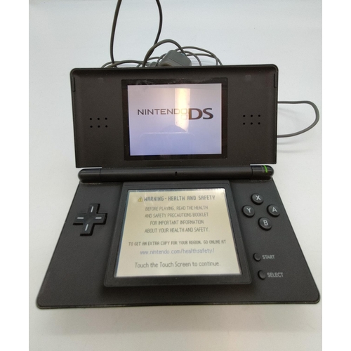 394 - Nintendo DS Lite with Charger W/O.