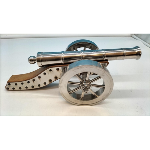 56 - Wood and Stainless Steel Cannon. 36cm Long, 12cm High.