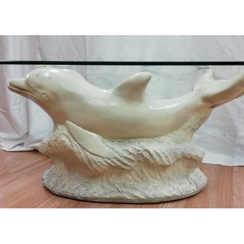 115 - Glass Topped Dolphin Coffee Table. 40cm High, 66cm x 60cm. Incorrect Glass. This Lot is Collection O... 