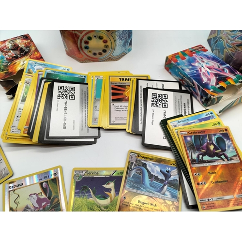 130A - Pokemon Trading Cards in 2 Tins.