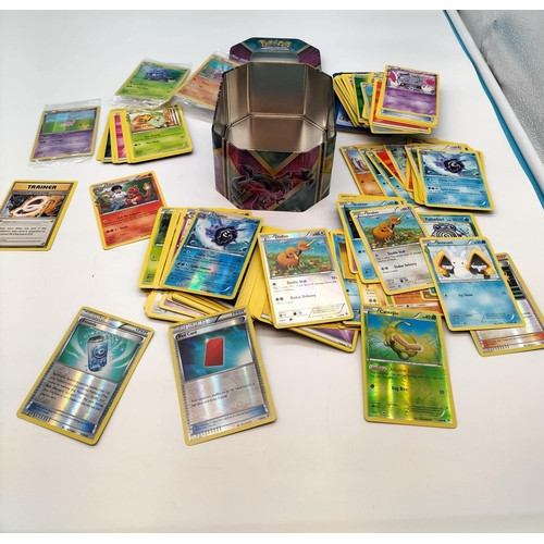 130A - Pokemon Trading Cards in 2 Tins.