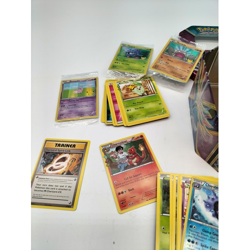 130A - Pokemon Trading Cards in 2 Tins.