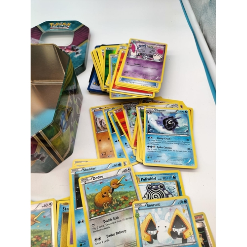 130A - Pokemon Trading Cards in 2 Tins.