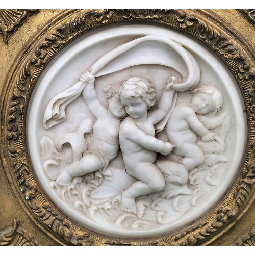 137 - Ornate Carved and Framed Cherub Scene. 31cm x 31cm.