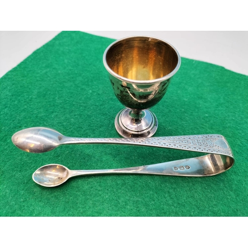 143 - Pair of Silver Sugar Tongs plus Silver Egg Cup. 54 Grams.