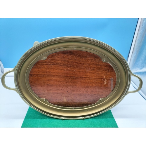 148 - Arts and Crafts Brass and Wood Tray. Marked to Foot. 47cm x 31cm.